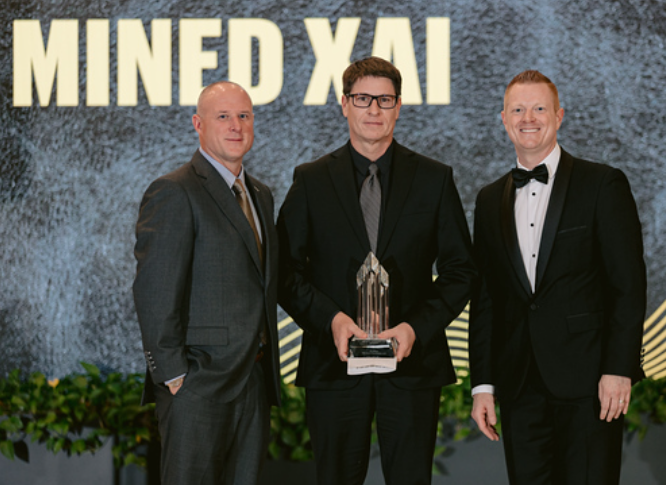 Ryan Kramer accepts the Entrepreneur of the Year award alongside Dayton Business Journal team members